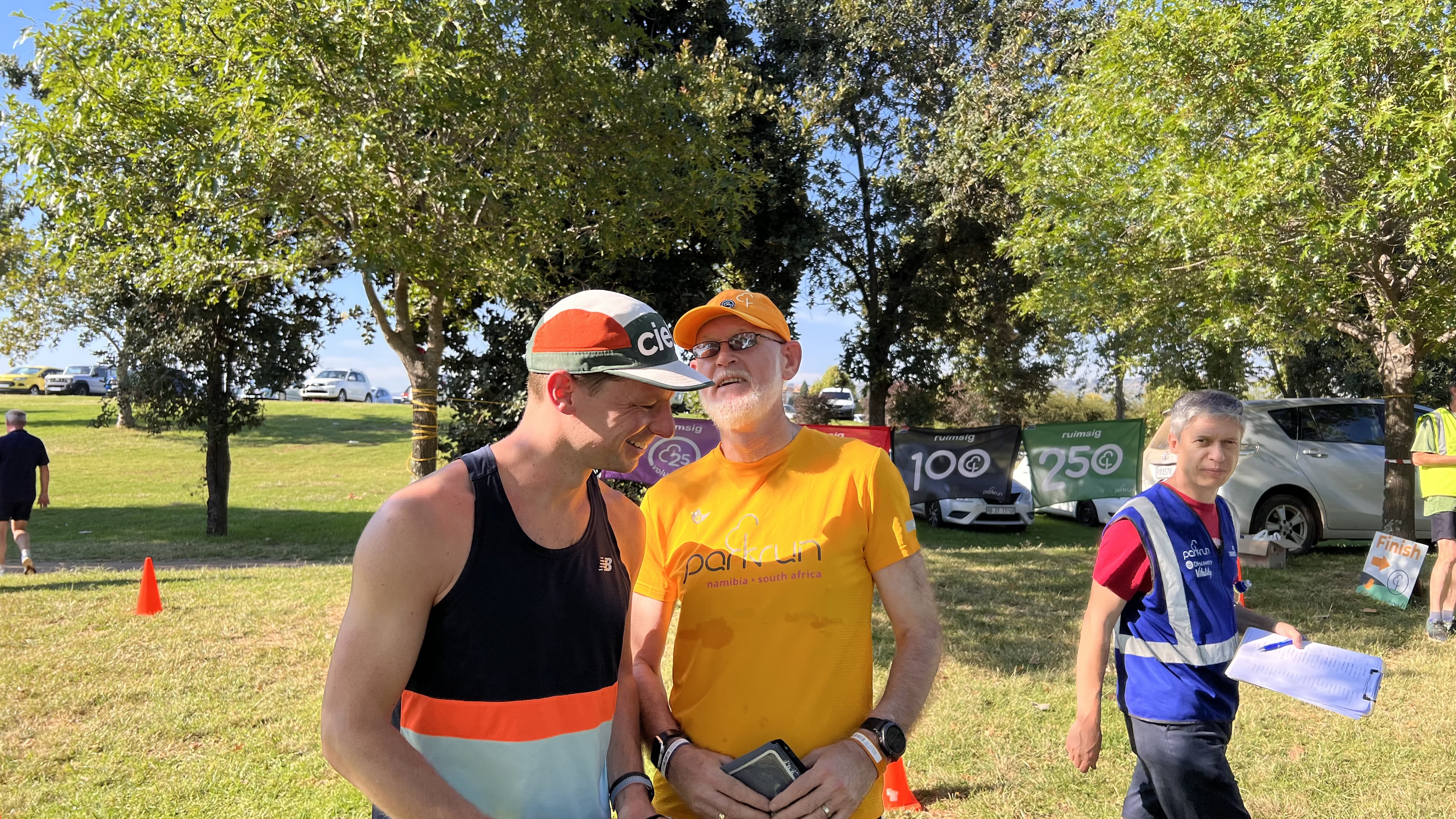 Having a word with Russ Jefferys at Ruimsig parkrun - I was dared to whisper something in his ear!
