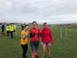 Samantha, Katie and Lisa showing 1, 2 and 3 with their fingers as they were the first three ladies to finish