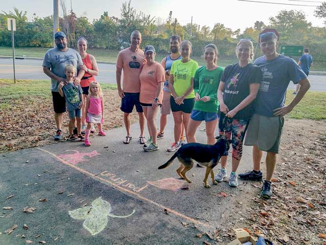 Participants on Third Creek Greenway for a practice parkrun event.