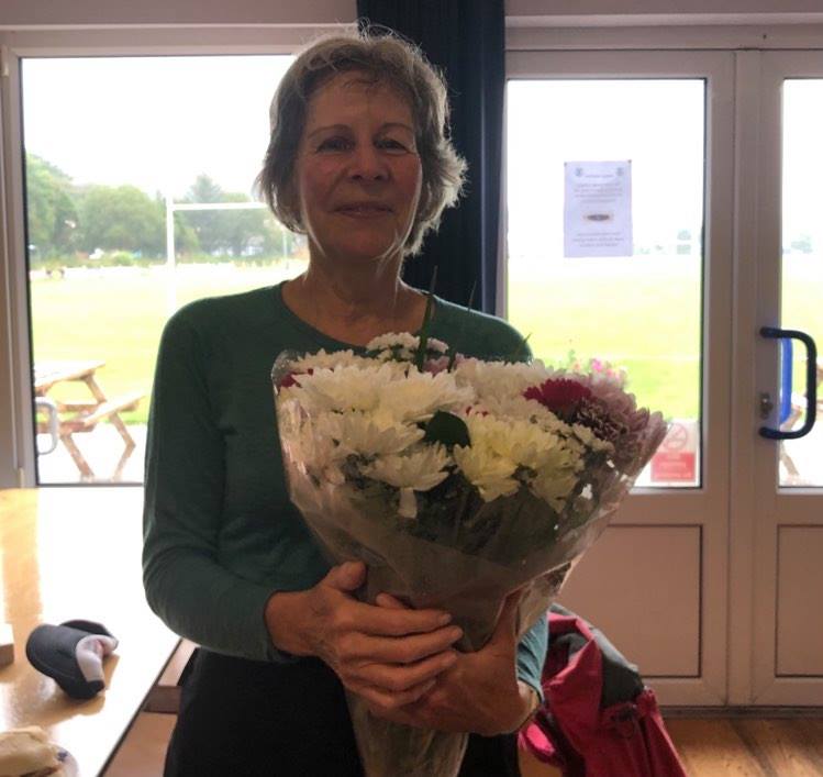 Anita, our outgoing event director, with some flowers to say "thanks".
